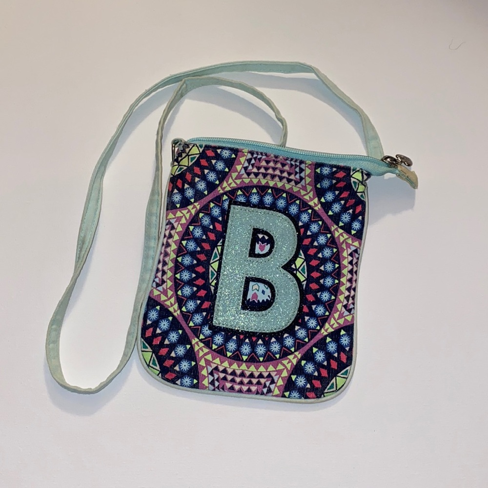 Justice shoulder strap bag.